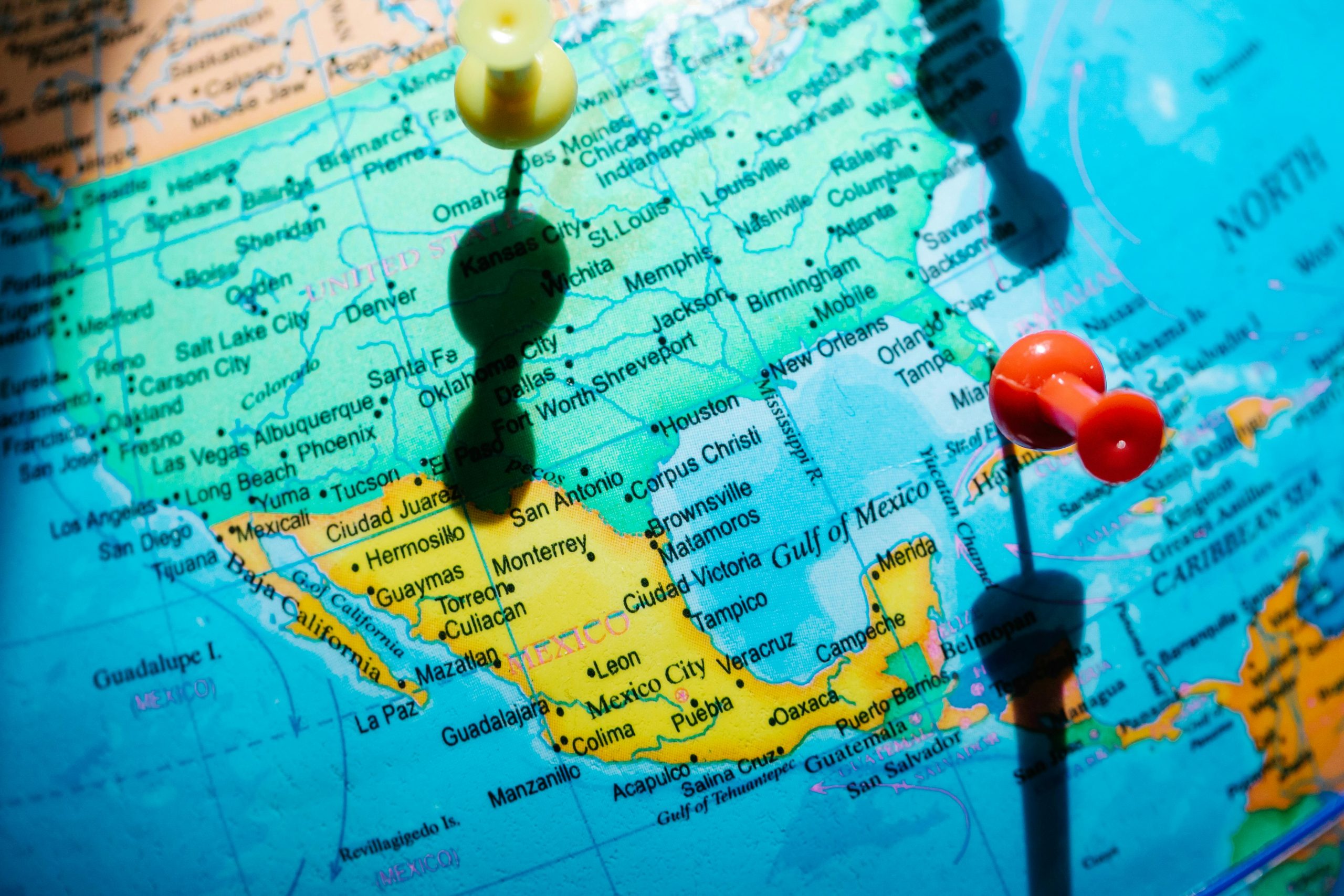 Should I focus on homepage SEO or build detailed country/location pages for international traffic?